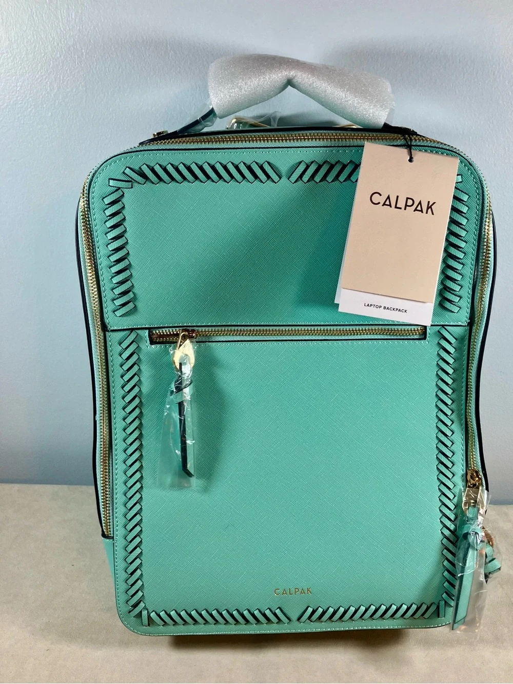 NEW! CALPAK KAYA 15” Laptop Student Travel Backpack in Aqua UNUSED WITH TAGS